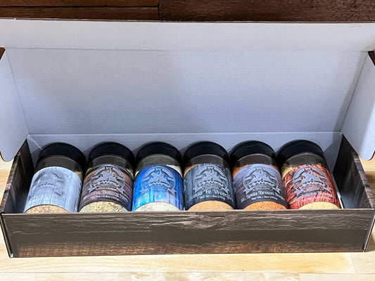 Hi-West Gift Box with 6 unique BBQ seasoning flavors in a wooden display.